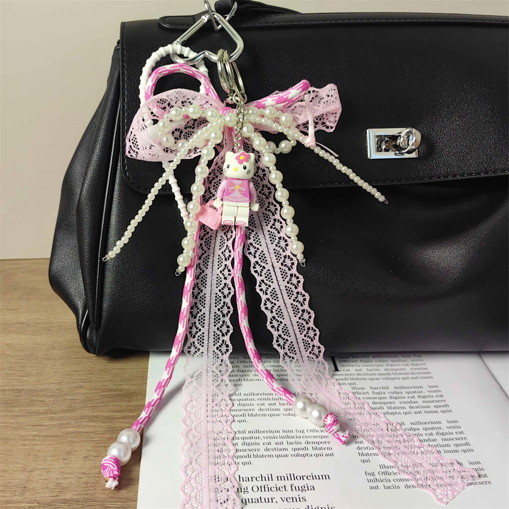 Adorable Pink KT Cat Puzzle Keychain with Lace-Trimmed Cord: Perfect Bag Charm for Girls