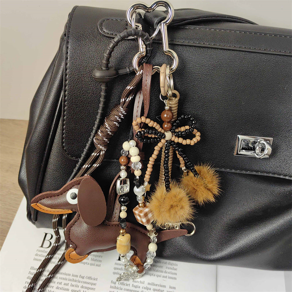 Maximalism Brown Series Sausage Dog Charm with Bow and Pom-Pom