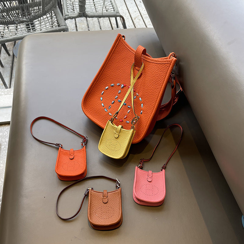 Mini Evelyne Bag Charm - Cute Top-Grain Togo Leather Accessory for Lipstick, Earphones