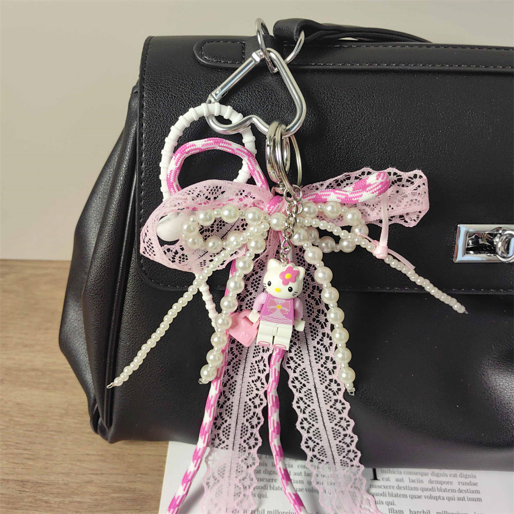 Adorable Pink KT Cat Puzzle Keychain with Lace-Trimmed Cord: Perfect Bag Charm for Girls