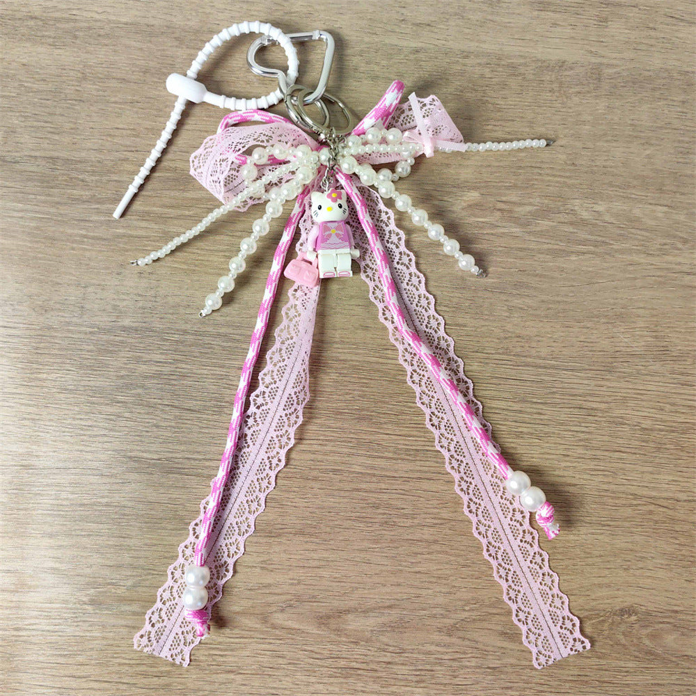 Adorable Pink KT Cat Puzzle Keychain with Lace-Trimmed Cord: Perfect Bag Charm for Girls